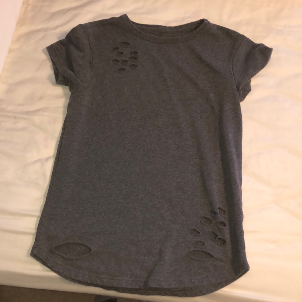 Alphalete distressed tee shirt sleeve